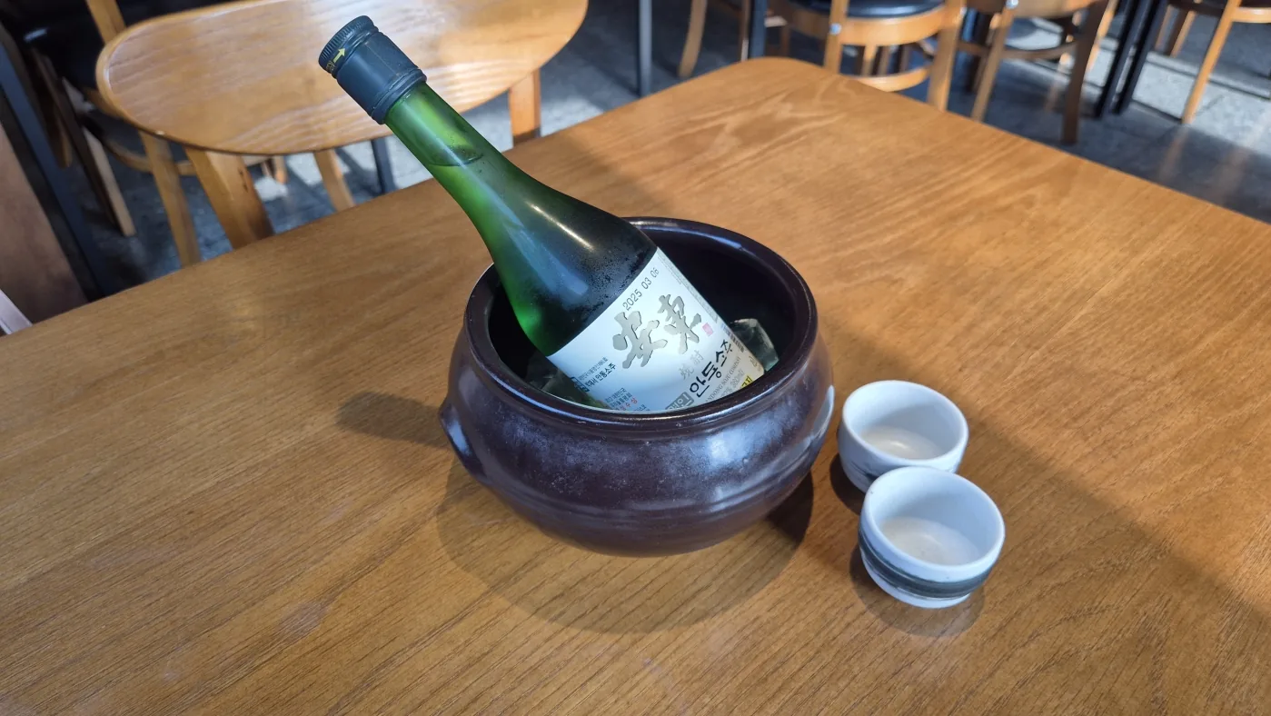 Korean drinks and shared cups arranged for a local culture experience